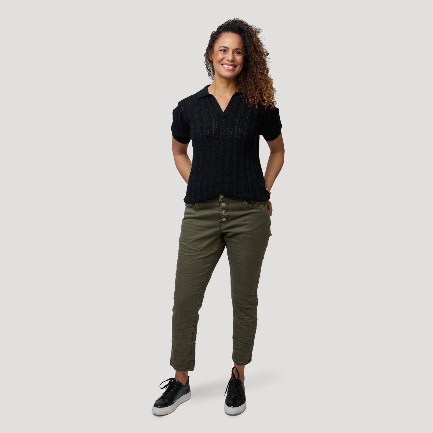 Stickad topp till gröna jeans